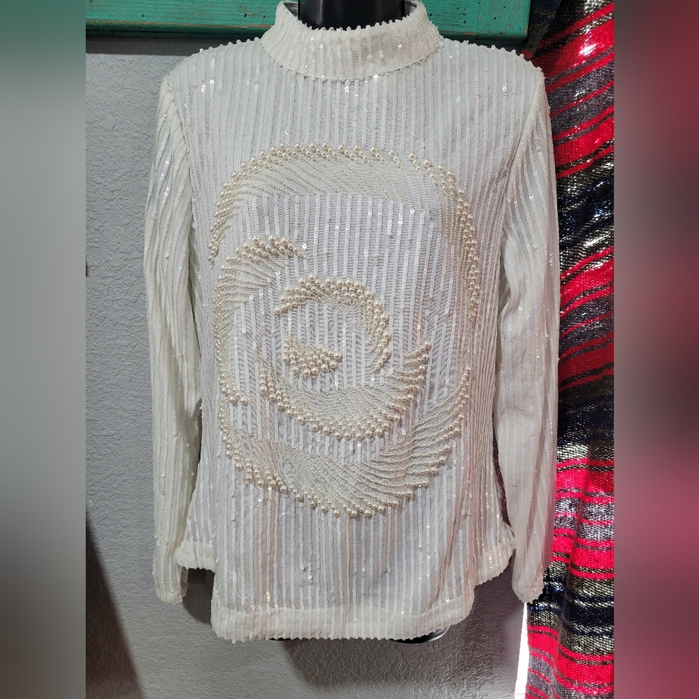 Beautiful sweater with jeweled details